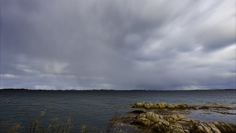 Heavy-storm-clouds-approaching-the-rocky-seashore