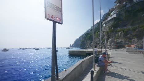 Amalfi-Positano-Italy-Immersive-Travel-Tourism-Mediterranean-Sea-Coast-Water-Europe,-Walking,-4K-|-Fast-Movement-to-Boat-Pier-and-Turn-Towards-Mountainside