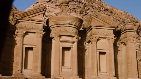 Reveals-Monumental-Building-Carved-Out-Of-Rock-In-Ad-Deir-Monastery-In-Petra,-Jordan-During-Sunset