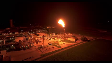 The-Radiant-Light-from-Gas-Flaring-Brightens-the-Nearby-Surroundings---Aerial-Drone-Shot