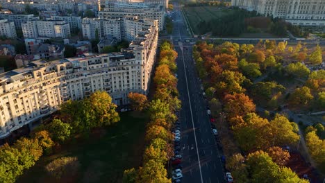 Slow-Aerial-Reveal-Over-The-Palace-of-Parliament-At-Sunset-In-Bucharest,-Romania,-Autumn-Colors