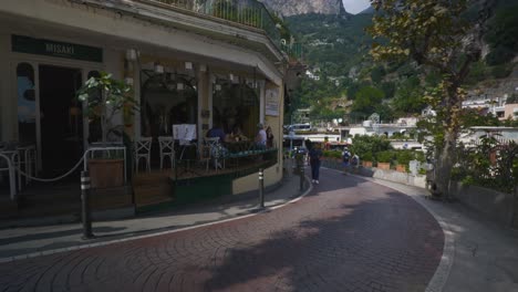 Amalfi-Positano-Italy-Immersive-Travel-Tourism-Mediterranean-Sea-Coast-Water-Europe,-Walking,-4K-|-Bus,-Valley,-Shadows,-Mountainside,-Cliffs,-Looking-Around,-Shaky,-Shop,-Fast,-Traffic