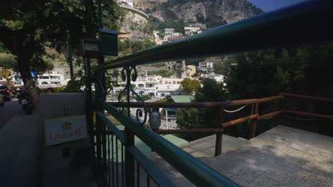 Amalfi-Positano-Italy-Immersive-Travel-Tourism-Mediterranean-Sea-Coast-Water-Europe,-Walking,-4K-|-Couple,-Valley,-Shadows,-Mountainside,-Cliffs,-Traffic,-Looking-Around,-Shaky,-Roof-Top
