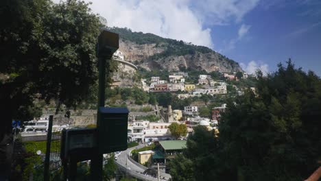 Amalfi-Positano-Italy-Immersive-Travel-Tourism-Mediterranean-Sea-Coast-Water-Europe,-Walking,-4K-|-Couple,-Valley,-Shadows,-Mountainside,-Cliffs,-Traffic,-Looking-Around,-Shaky,-Roof-Top,-Shop
