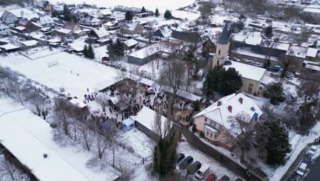 Christmas-market-Winter-Snow-Village,-cloudy-Germany
