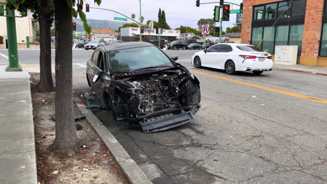 Sedan-stolen,-wrecked,-and-vandalized-on-the-streets-of-Oakland,-California