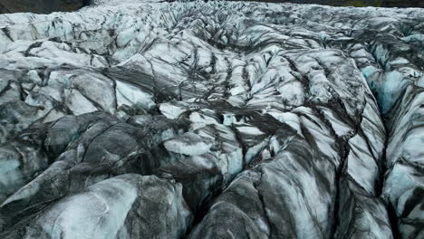 Across-glacier-crevices,-surface-of-ice-caps,-natural-attraction,-aerial-shot