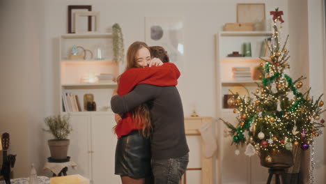 Couple-hugging-each-other-in-living-room