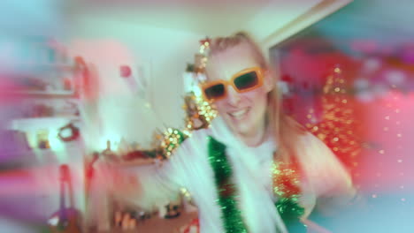 Excited-woman-singing-while-dancing-at-illuminated-home-during-Christmas