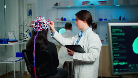 Back-view-of-woman-patient-wearing-performant-brainwave-scanning