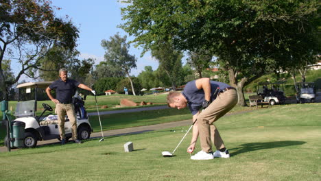 Slow-Motion-Shot-Of-Male-Golfer-Playing-Tee-Shot