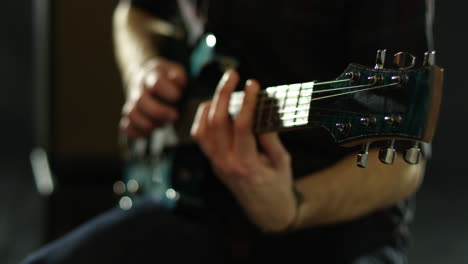 Close-Up-Of-Man-Playing-Electric-Guitar-Shot-On-R3D