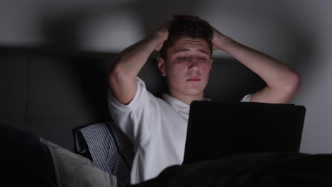 Teenage-Victim-Of-Cyber-Bullying-Using-Laptop-Shot-On-R3D