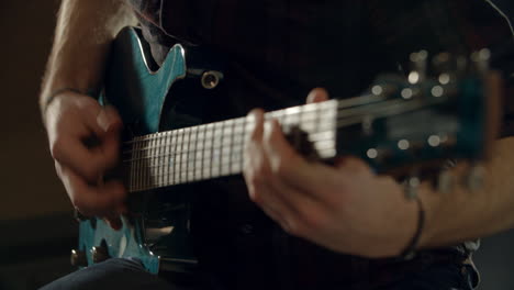 Slow-Motion-Shot-Of-Man-Playing-Electric-Guitar