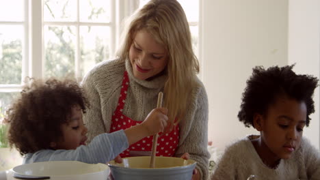 Mother-And-Children-Baking-Cake-At-Home-Shot-On-R3D