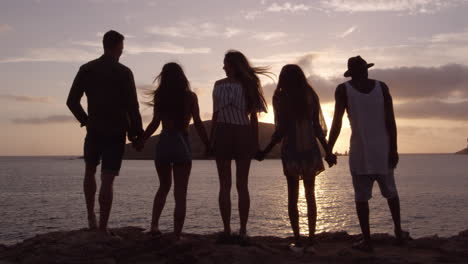 Friends-Standing-On-Cliff-Watching-Sunset-Shot-On-R3D