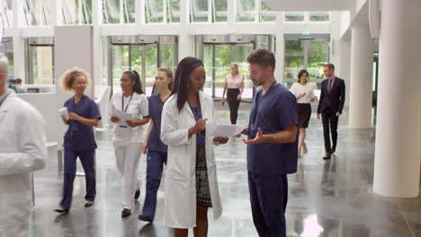 Staff-In-Busy-Lobby-Area-Of-Modern-Hospital-Shot-On-R3D