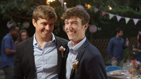 Gay-Couple-Celebrating-Wedding-With-Party-In-Backyard