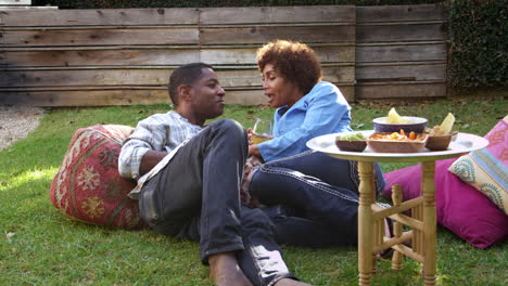 Mature-Couple-Relax-In-Garden-Together-Shot-On-R3D