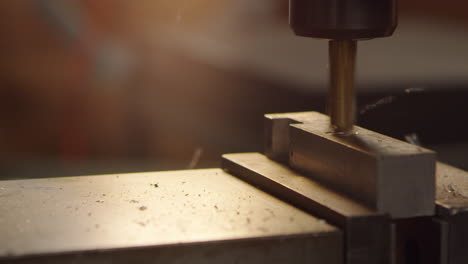 Close-Up-Of-Drilling-Metal-Block-In-Factory-Shot-On-R3D