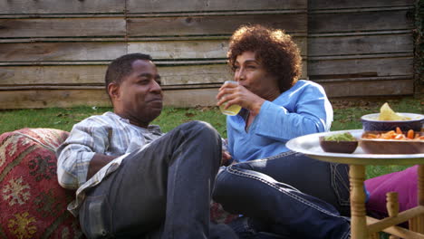 Mature-Couple-Relax-In-Garden-Together-Shot-On-R3D