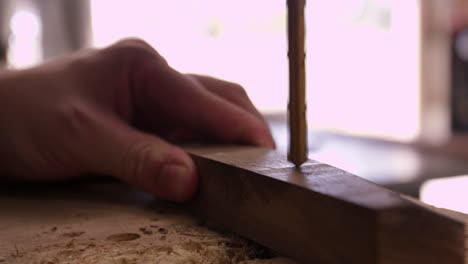 Close-Up-Of-Drilling-Wooden-Block-In-Factory-Shot-On-R3D