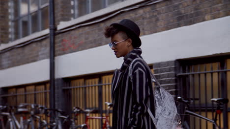 Stylish-Fashion-Blogger-Standing-In-Urban-Street
