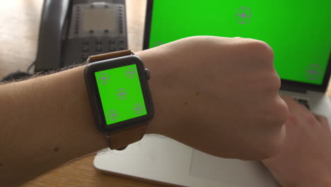 Businessman-Picks-Up-Message-On-Smartwatch-With-Green-Screen