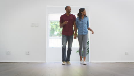 Excited-Young-Couple-Moving-Into-New-Home-Together