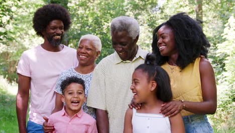 Multi-generation-black-family-taking-a-break-during-a-hike