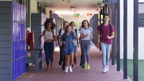 Teenage-school-kids-running-in-high-school-hallway