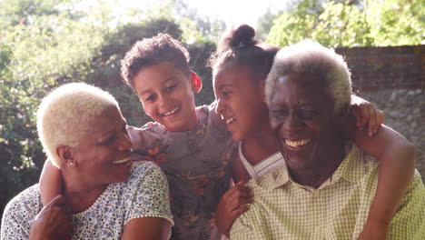 Senior-black-couple-and-grandchildren-outdoors,-close-up