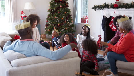 Multi-Generation-Family-Talking-And-Telling-Stories-As-They-Celebrate-Christmas-At-Home-Together