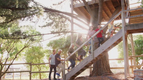 Multi-Generation-Family-Climbing-Outdoor-Wooden-Platform-To-Tree-House-In-Garden