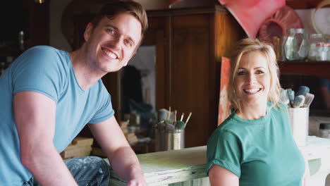 Portrait-Of-Couple-In-Workshop-Upcycling-And-Working-On-Craft-Projects