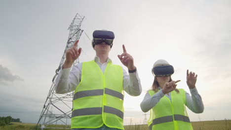 Energy-engineers-use-virtual-reality-glasses-to-control-the-solar-panel-system-and-deliver-energy-to-consumers.-Engineers-of-the-future.