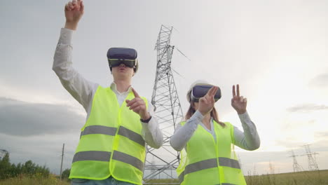 High-voltage-power-lines-under-the-control-of-two-engineers-using-virtual-reality-to-control-power.-Alternative-energy-sources-in-a-modern-city.