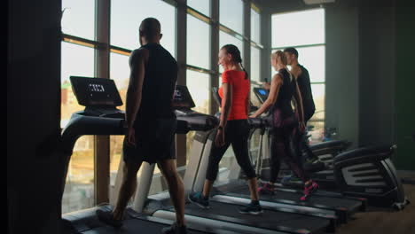 People-training-in-a-gym-using-treadmills-and-Elliptical-Cross-or-Training-in-a-Gym