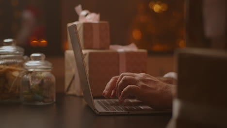 On-Christmas-Eve-Santa-Claus-replies-to-an-obedient-child's-email.-High-quality-4k-footage