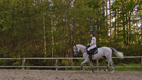 This-is-the-best-moment-of-horse-riding-training-for-female.-She-demonstrates-galloping-skills-with-her-horse-in-nature.