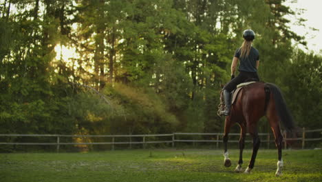 This-is-the-best-view-on-professional-horseback-riding.-Young-women-is-riding-on-her-horse.
