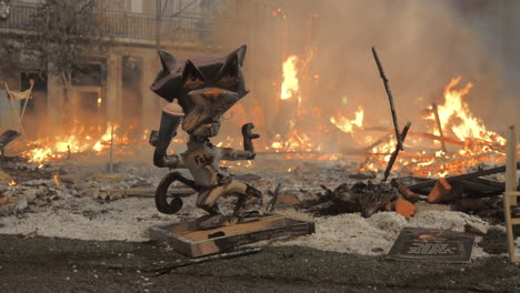 The-satirical-cat-figure-against-the-dying-bonfire-after-the-Falles-night