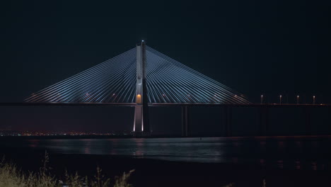 City-waterfront-and-Vasco-da-Gama-Bridge-at-night-Portugal