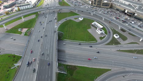 An-aerial-view-of-a-large-road-junction-close-to-the-open-parking-lot