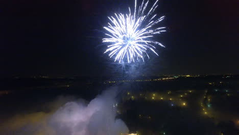 An-aerial-view-of-a-huge-beautiful-firework-in-a-pitch-black-sky