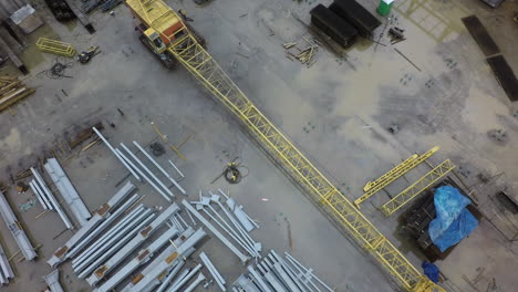 An-aerial-view-of-a-construction-crane-lying-on-the-ground