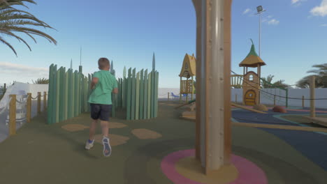 Boy-having-fun-on-large-playground