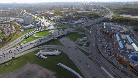 An-aerial-view-of-a-sunny-urbanscape-with-a-road-junction-in-the-middle