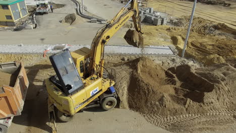 An-aerial-view-of-an-excavator-working-on-a-construction-site