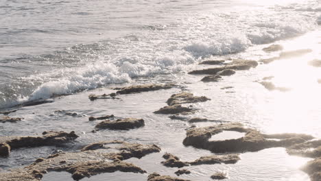 Ocean-waves-washing-volcanic-stones